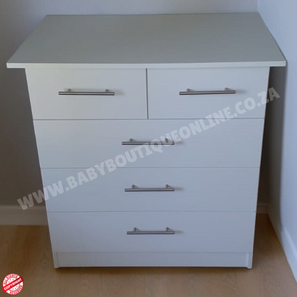 White dresser with four drawers and metal handles on a plain background