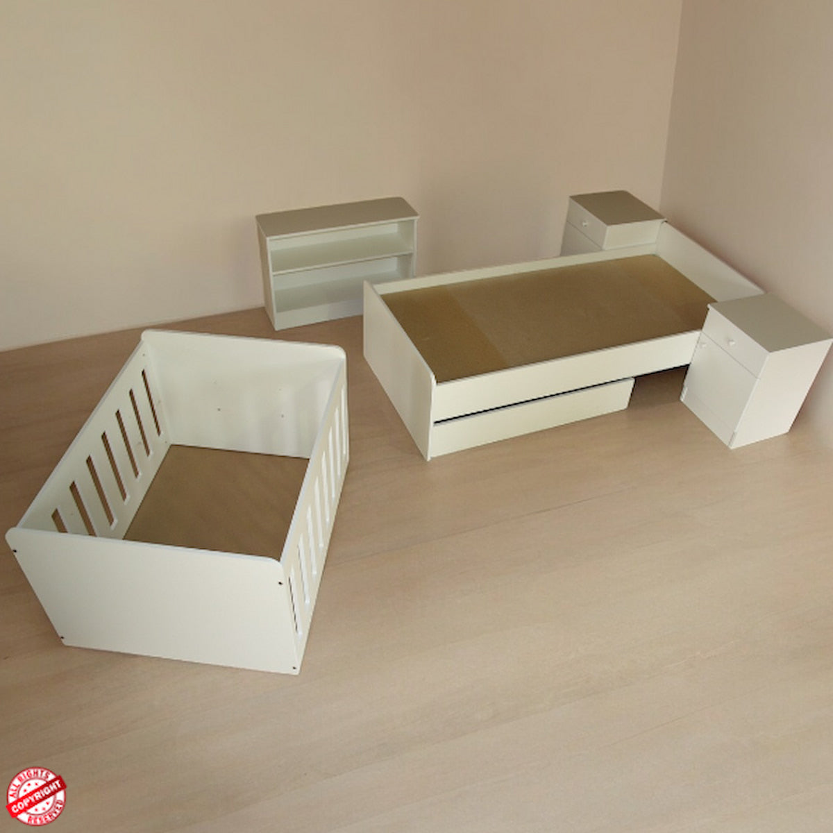 BabyBedroominaBox5-in-1Co turned into White wooden single bed set on a plain surface with a neutral background