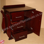 Wooden cabinet with drawers and a door on a beige background, featuring the website www.babyboutiqueonline.co.za.