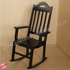 Black wooden rocking chair on a beige background with 'www.babyboutiquefurniture.co.za' text.