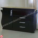 Black dresser with wooden top on a white background