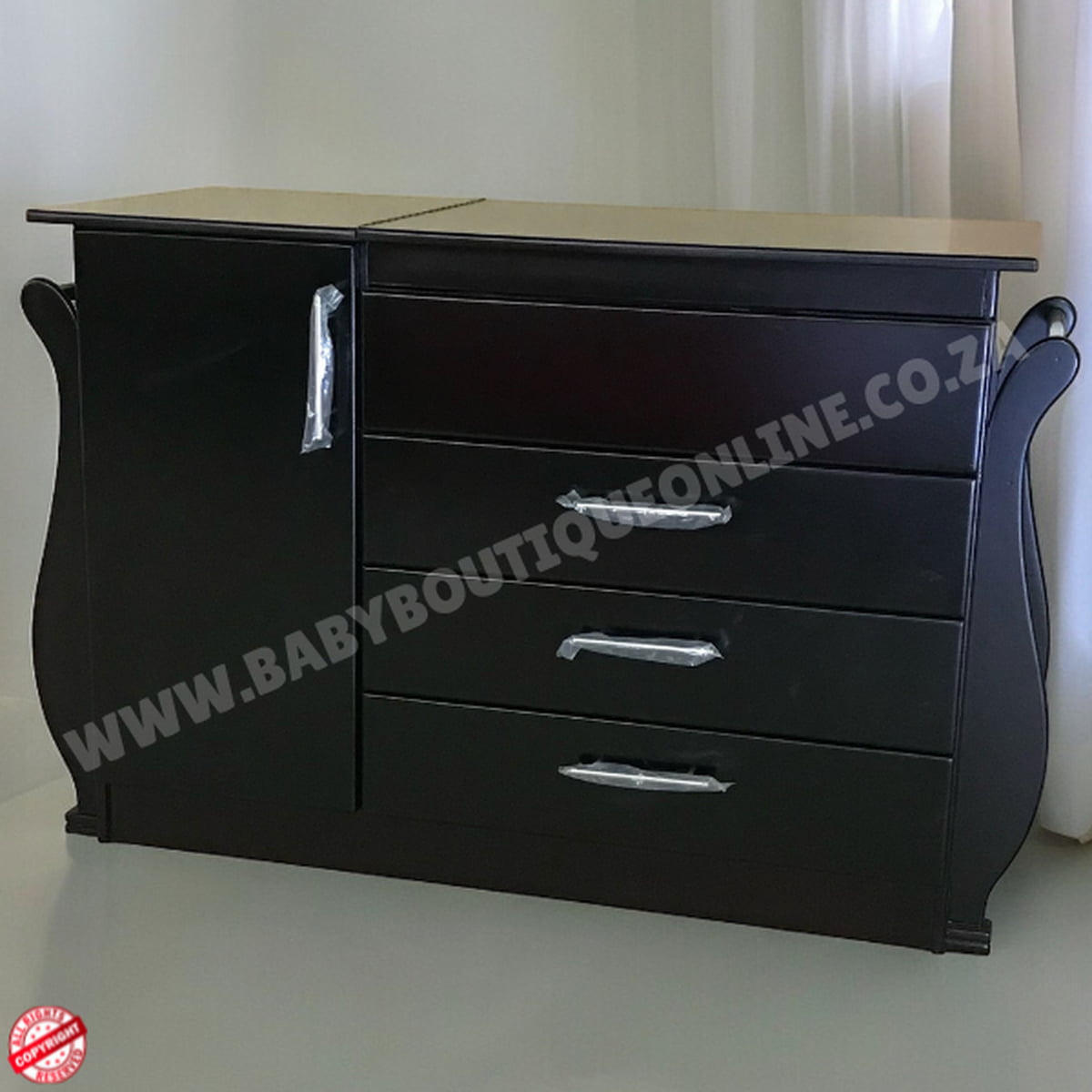 Black dresser with wooden top on a white background