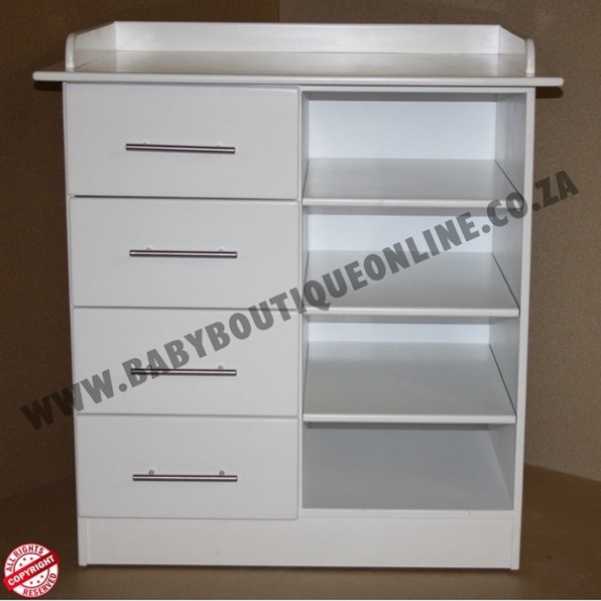White cabinet with drawers and shelves on a brown background, featuring 'Baby Boutique Online' branding.