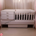 Babybedroominabox5-in-1Cot White baby crib with drawers in a room setting