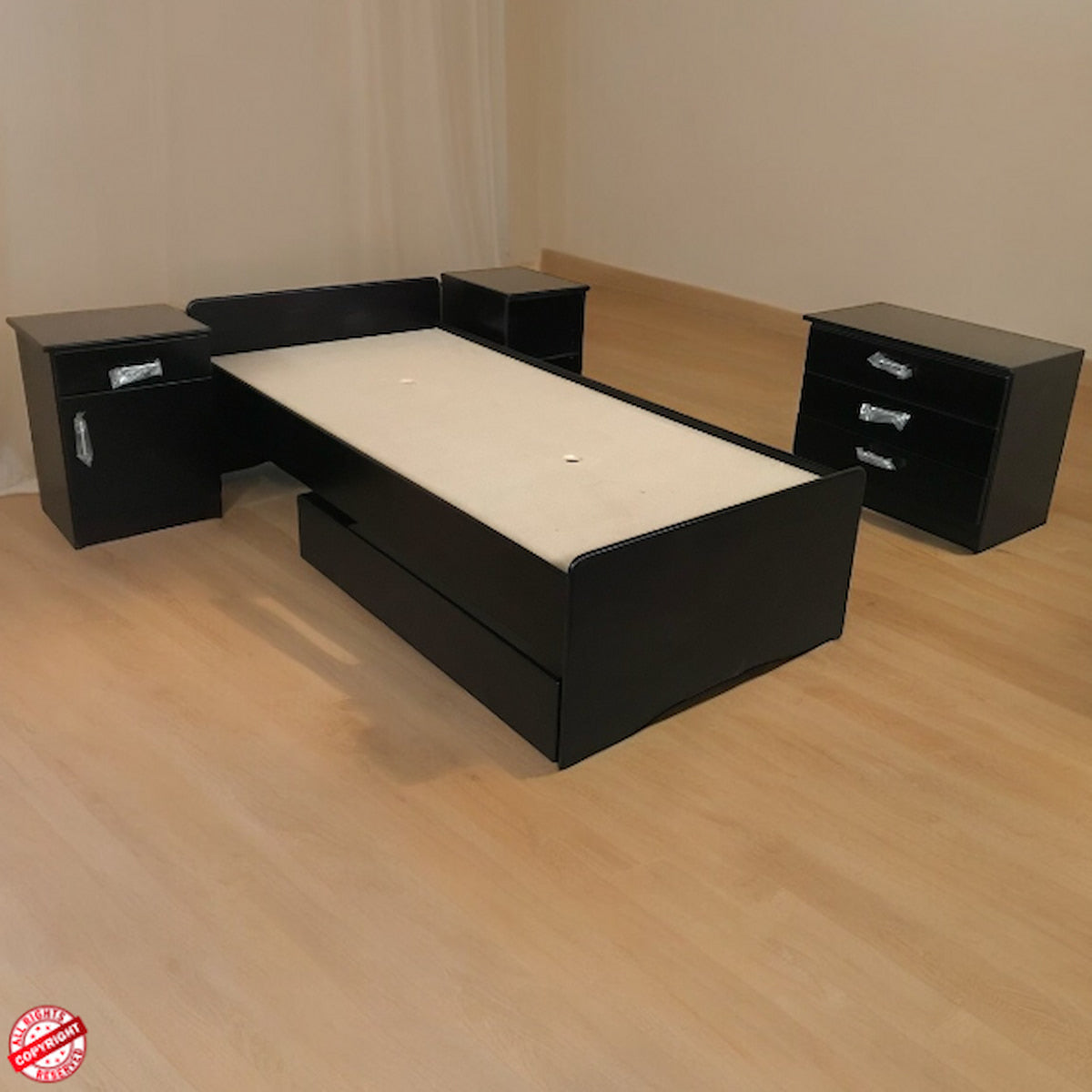 Black bed frame with storage drawers on a wooden floor.