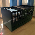 BabyBoutiqueTwinCotBurgundy in a baby room with wooden floors