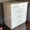 Two-toned dresser with white and wood finish on a wooden floor.