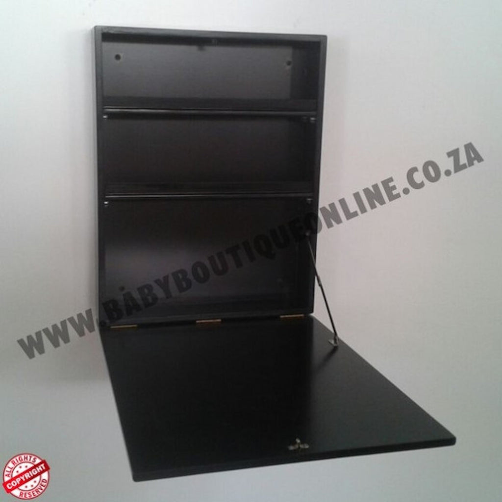 Black wall-mounted shelf on a white background with 'www.babyboutiqueonline.co.za' text.