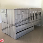 BabyBedroominabox5-in-1Cot Wooden crib with drawers on a plain background