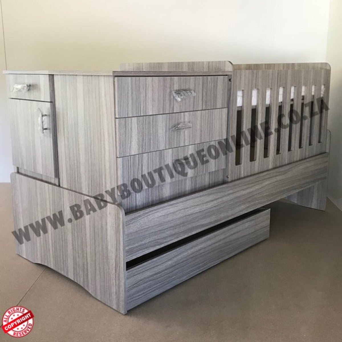 BabyBedroominabox5-in-1Cot Wooden crib with drawers on a plain background