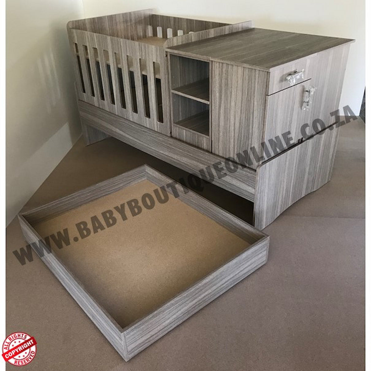 BabyBedroominabox5-in-1Cot Wooden crib with pull-out drawer and storage shelves on a plain background