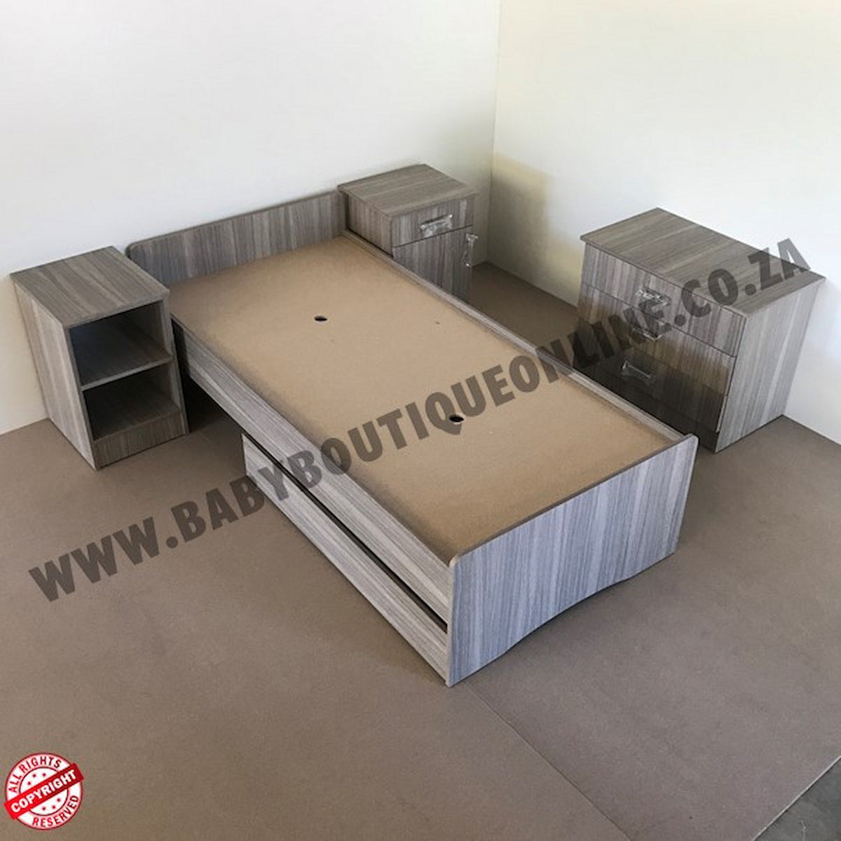 BabyBedroominabox5-in-1CotWooden children's bed with storage drawers on a plain floor.