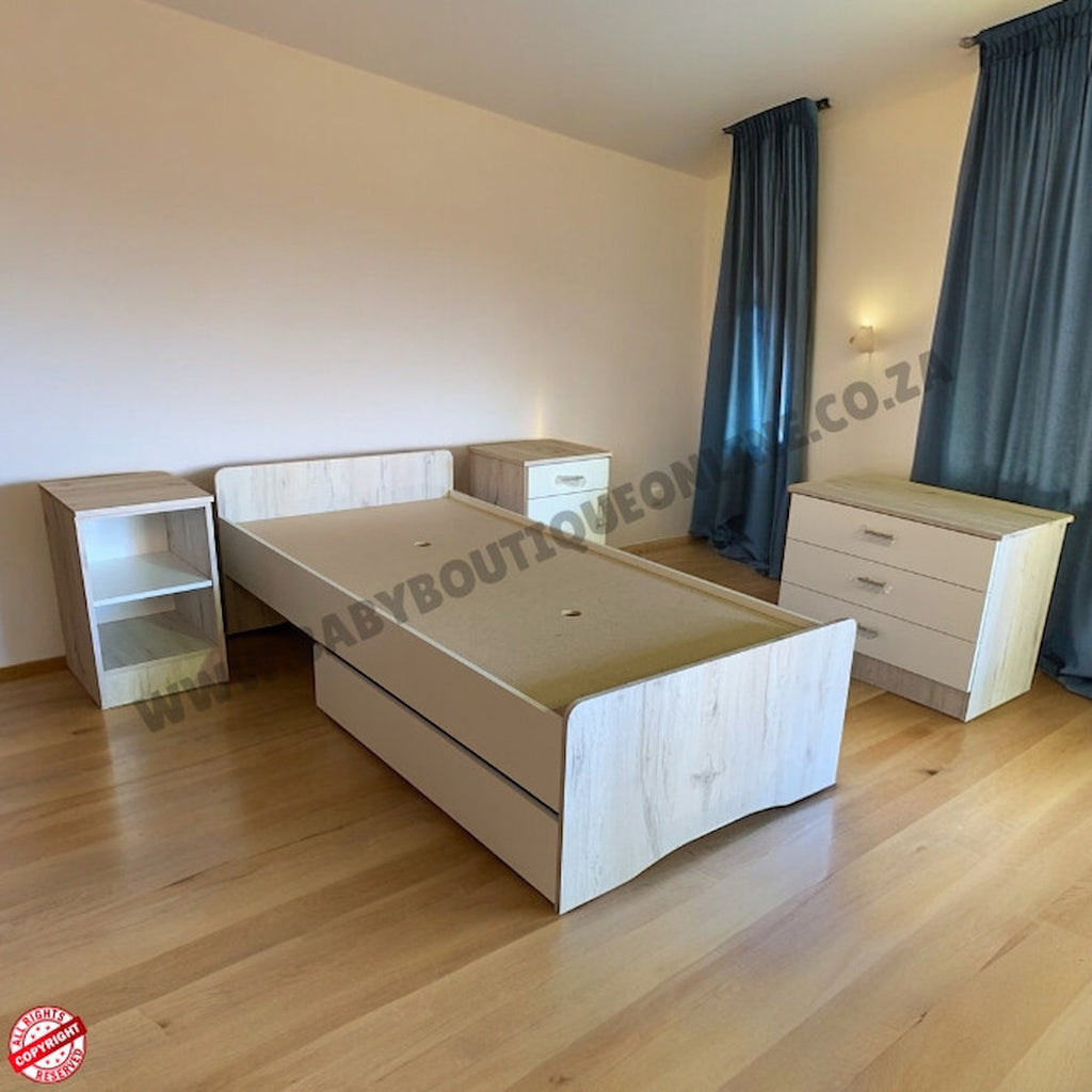 Wooden bed frame with storage drawers in a room with light-colored walls and wooden flooring.