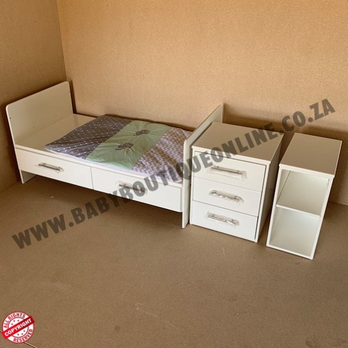 White children's bed with drawers and a small cabinet against a beige wall.