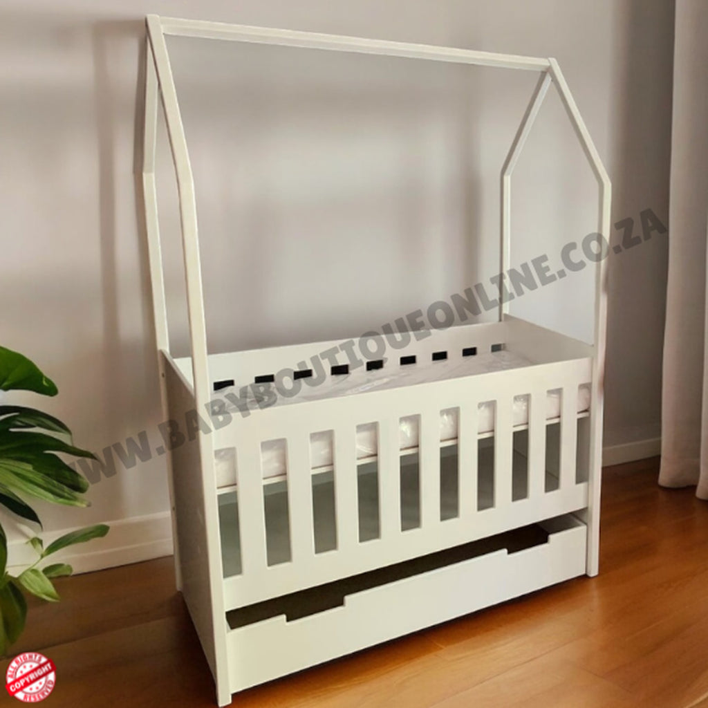 TentLargeCot-White in a baby room with wooden floor with window and plant