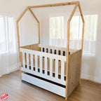 Tent LargeCot-Pine_White with a white base in a room with light-colored walls and wooden floor.