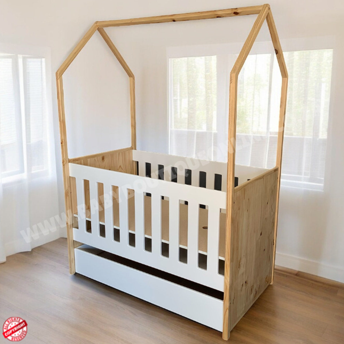 Tent LargeCot-Pine_White with a white base in a room with light-colored walls and wooden floor.