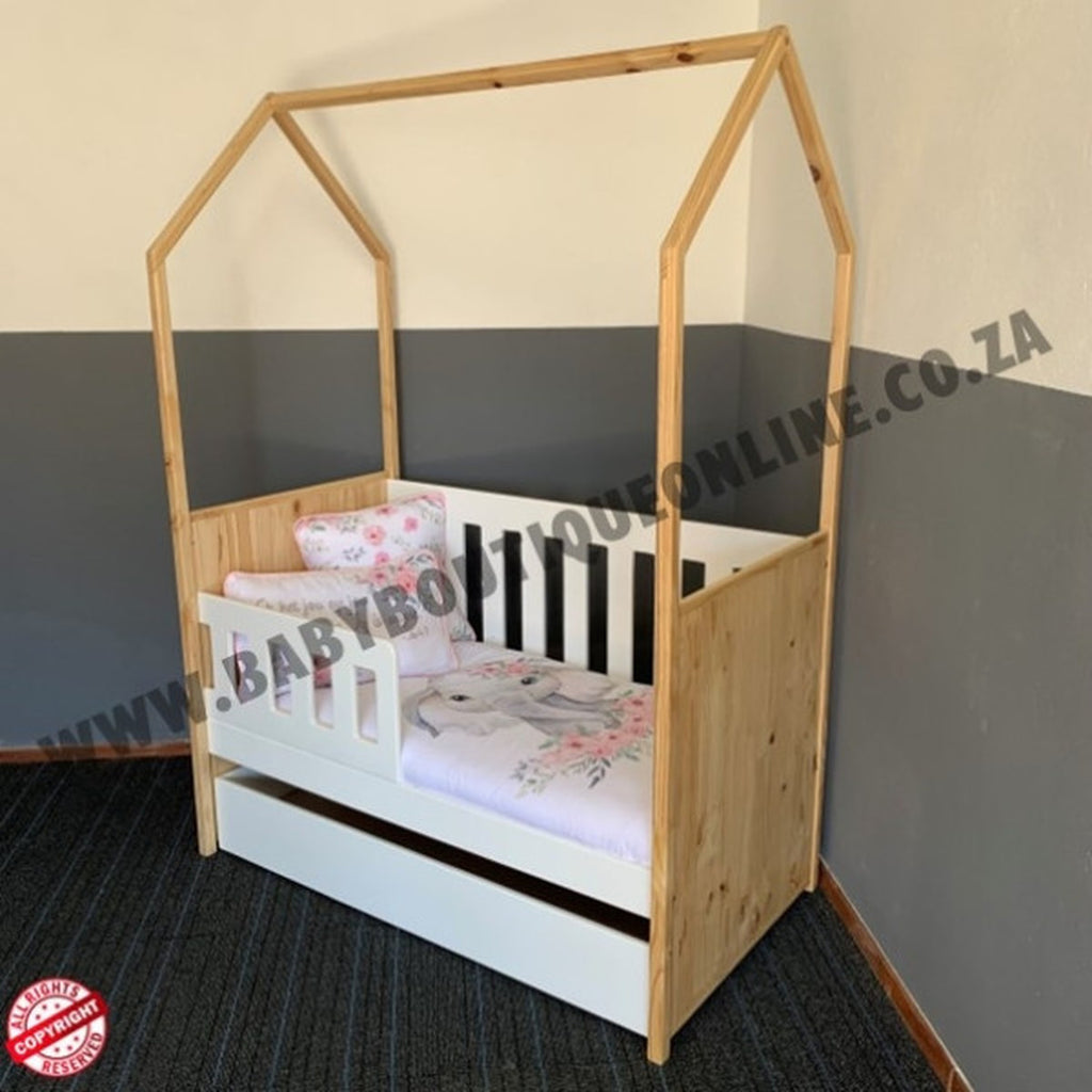Tent LargeCot-Pine_White with a white base in a room with light-colored walls and wooden floor.