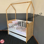 Tent LargeCot-Pine_White with a white base in a room with light-colored walls and wooden floor.