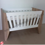 Emma Large Wooden Cot-White_Sahara Wooden crib with white mattress on a plain background