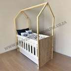 Tent Large Cot-White_OakSmoke with a canopy in a room setting, featuring a brand logo.