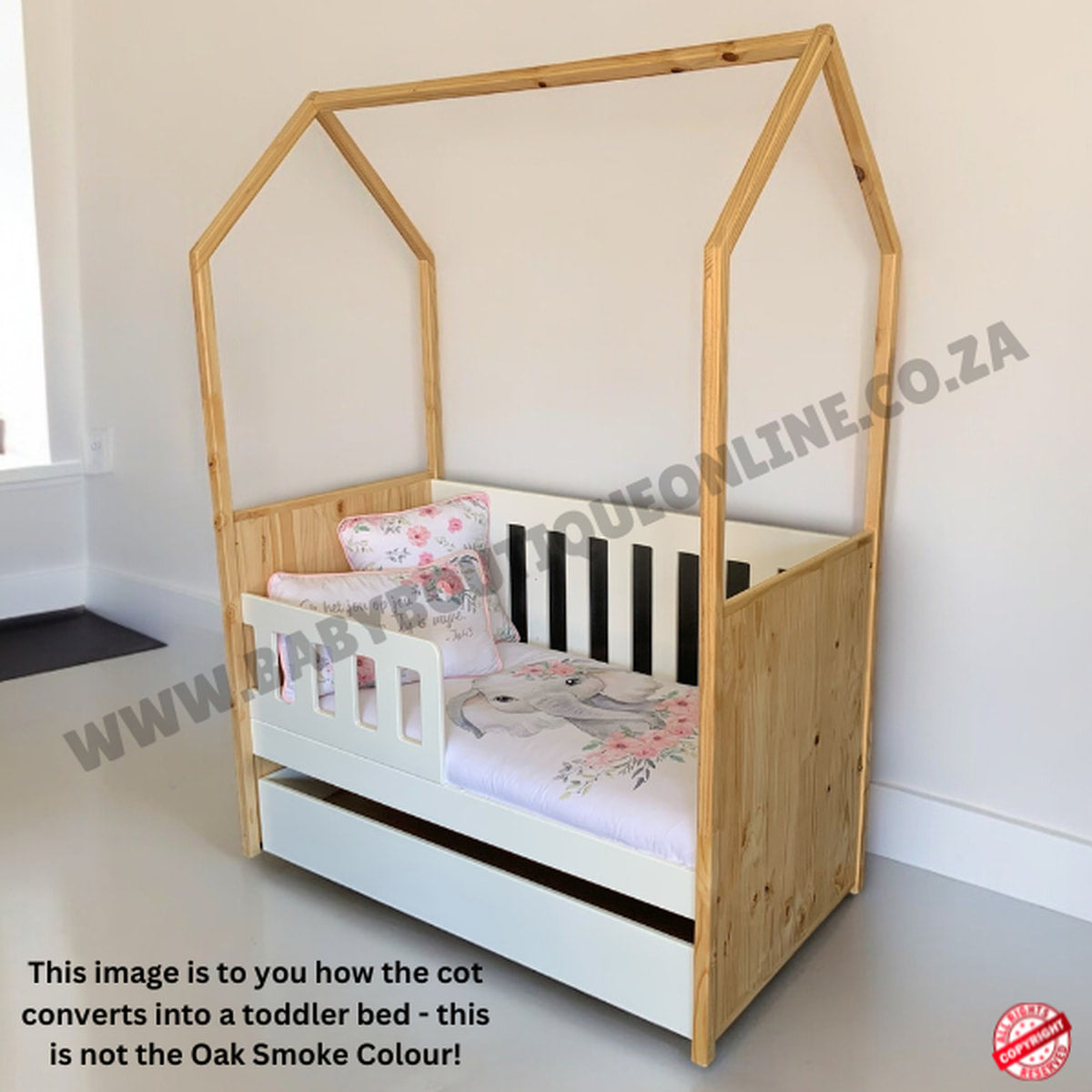 Tent Large Cot-White_OakSmoke with a house-shaped top, white mattress, and floral bedding on a light gray floor.