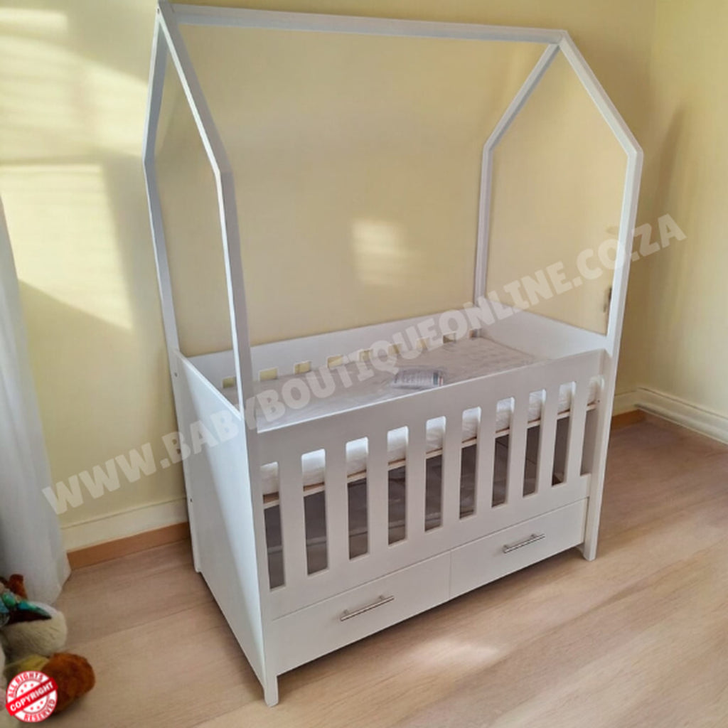 TentLargeCotwithDrawers-White in baby room with wooden floors and brown wall
