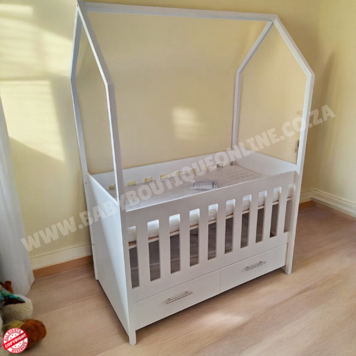 TentLargeCotwithDrawers-White in baby room with wooden floors and brown wall
