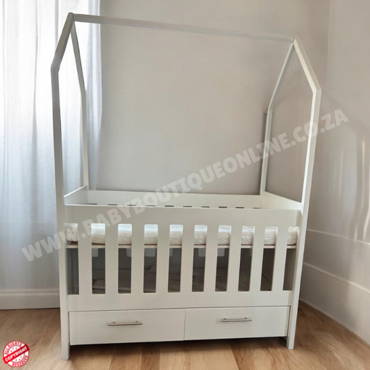 TentLargeCotwithDrawers-White in baby room with wooden floors and brown wall