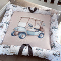 A baby play doughnut with a golf cart design in the center, featuring blue and beige colors and a washable cover.