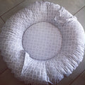 Doughnut - Grey Flower 01 Round cushion with a geometric pattern on a tiled floor