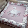 Doughnut - Pink Swan 01 Floral cushion with a swan design on a bed