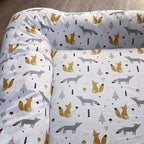 Baby Doughnut - Woodlands 01with fox pattern on a wooden floor