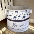 Children's storage bin with space-themed design and 'Bower' branding.