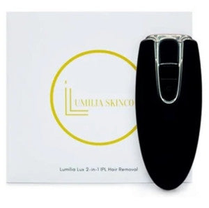 Black hair removal device with Luminia Skincare box in the background