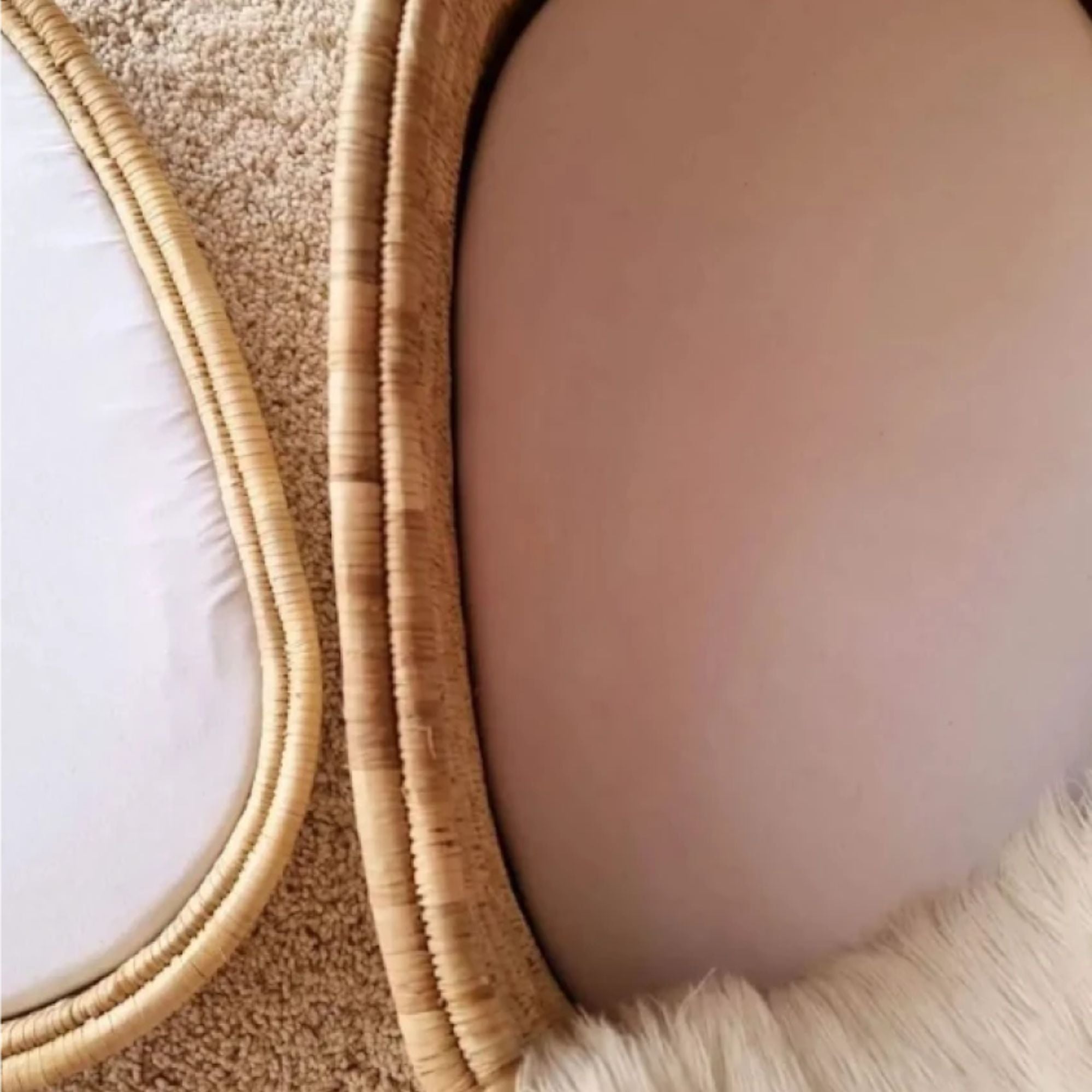 Close-up of a textured beige fabric with a blurred background